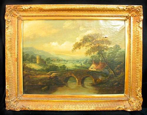 An extensive landscape with a figure crossing a stone bridge