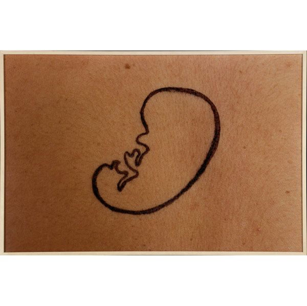 Two works of art: Fetus Female, 1995