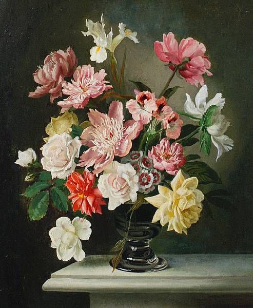 Vase of flowers on a ledge