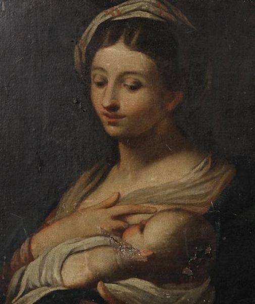A mother holding her baby
