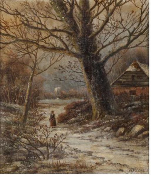 Winter woodland scene with figure on path