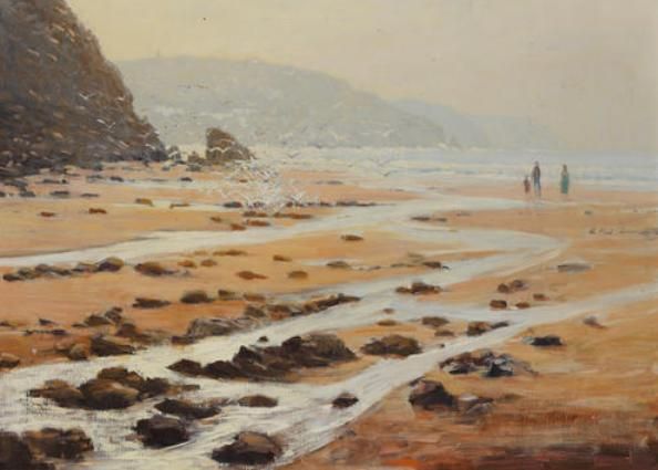 Figures walking on a beach