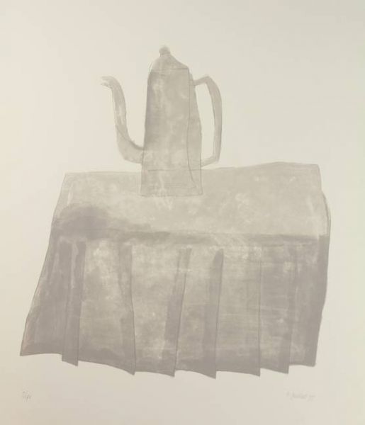 Grey coffee pot on a grey table