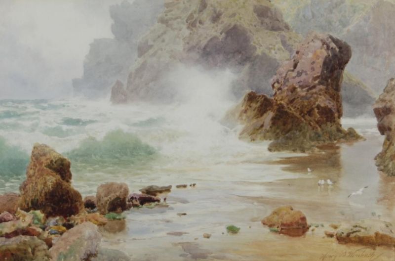 A rocky coastline, possibly in the Channel Islands
