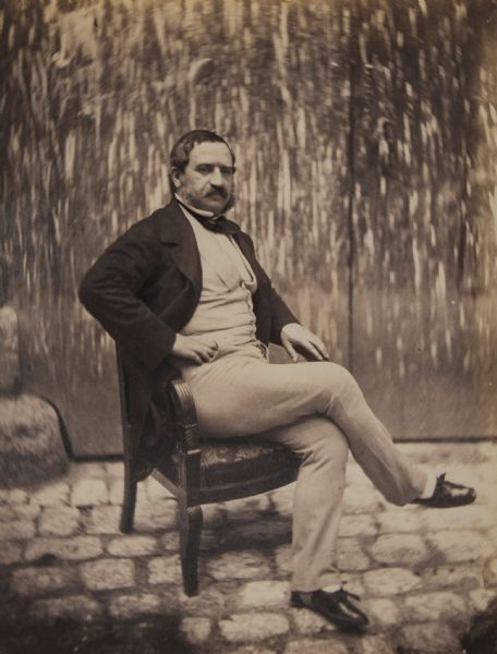 Two portraits of a Moustached Gentleman in the Courtyard of 21 Quay Bourbon