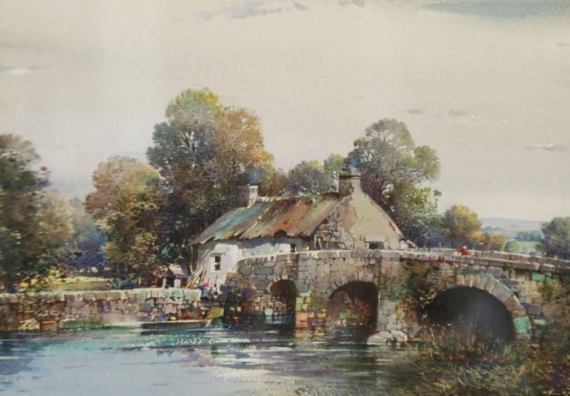 River, stone bridge and cottage